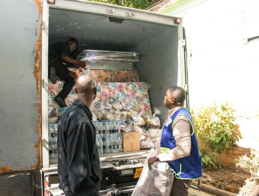 MLSS team uploads relief supplies into vehicle